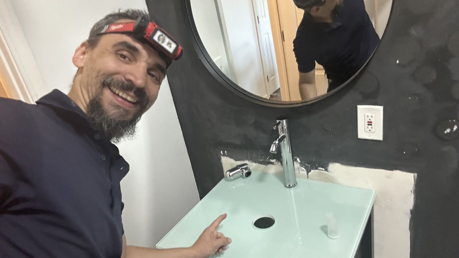 New glass sink and single-handle faucet installed