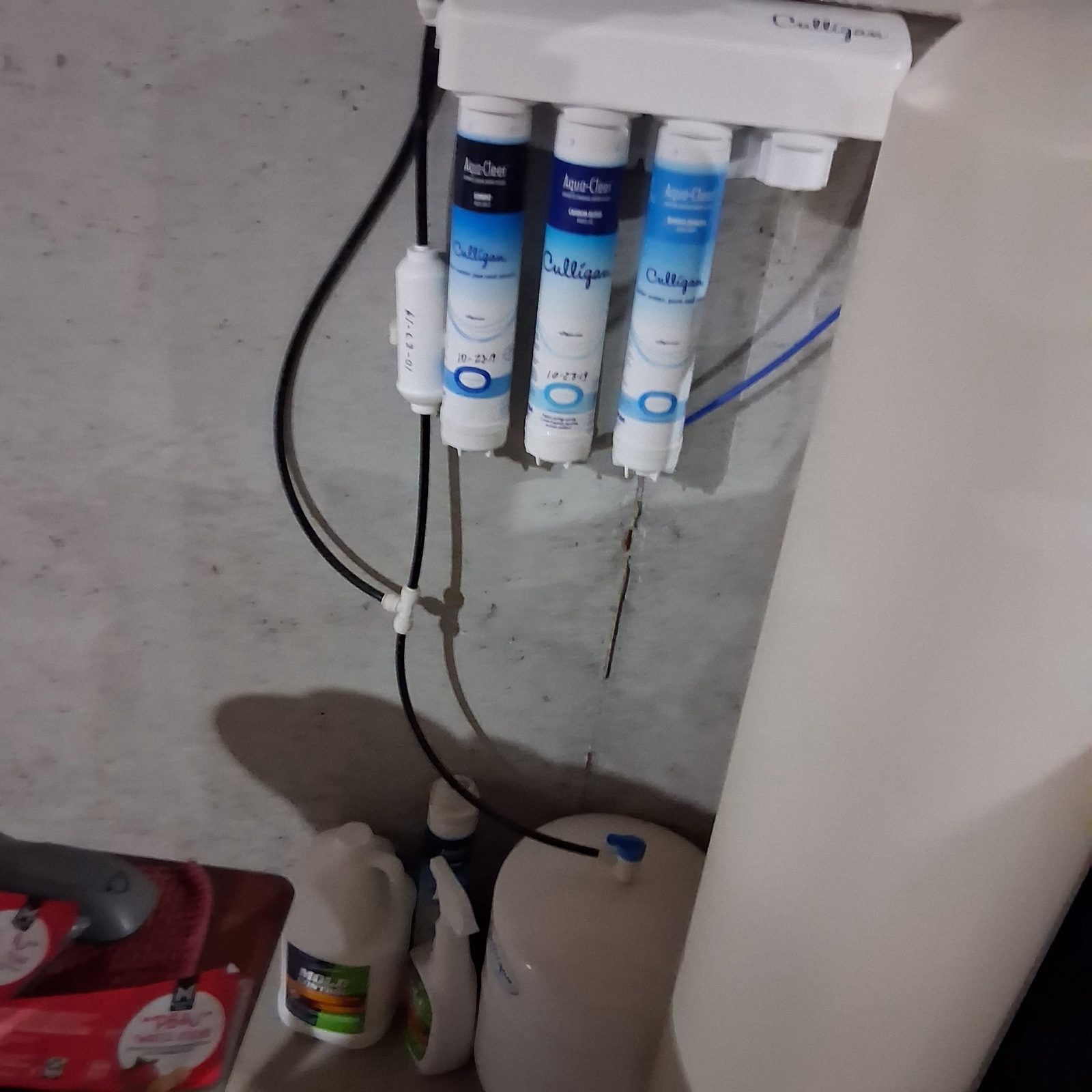 Multi-stage reverse osmosis filter cartridges mounted for a water treatment install by Gabriel, Your Job Done Now