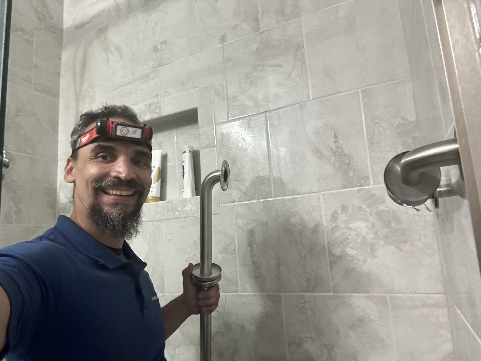 Finished shower grab bar and fixtures check