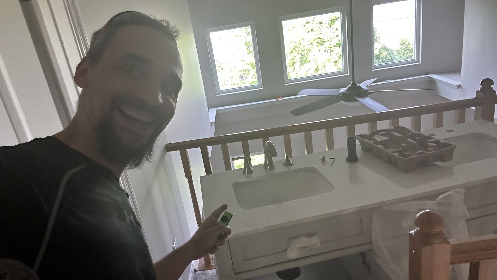 Bathroom vanity with a new faucet installed — plumbing job by Gabriel